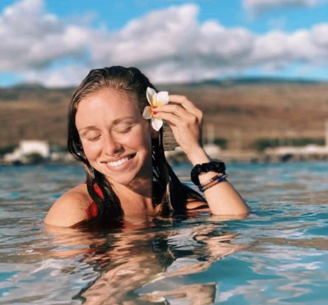 artist in the water, flowe in hair