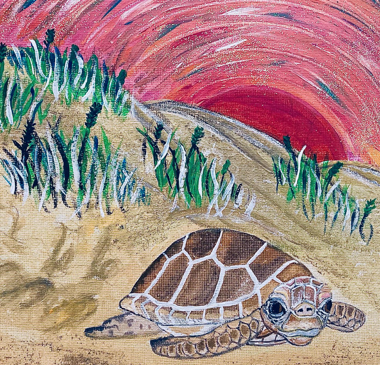 art - a turtle in the sand